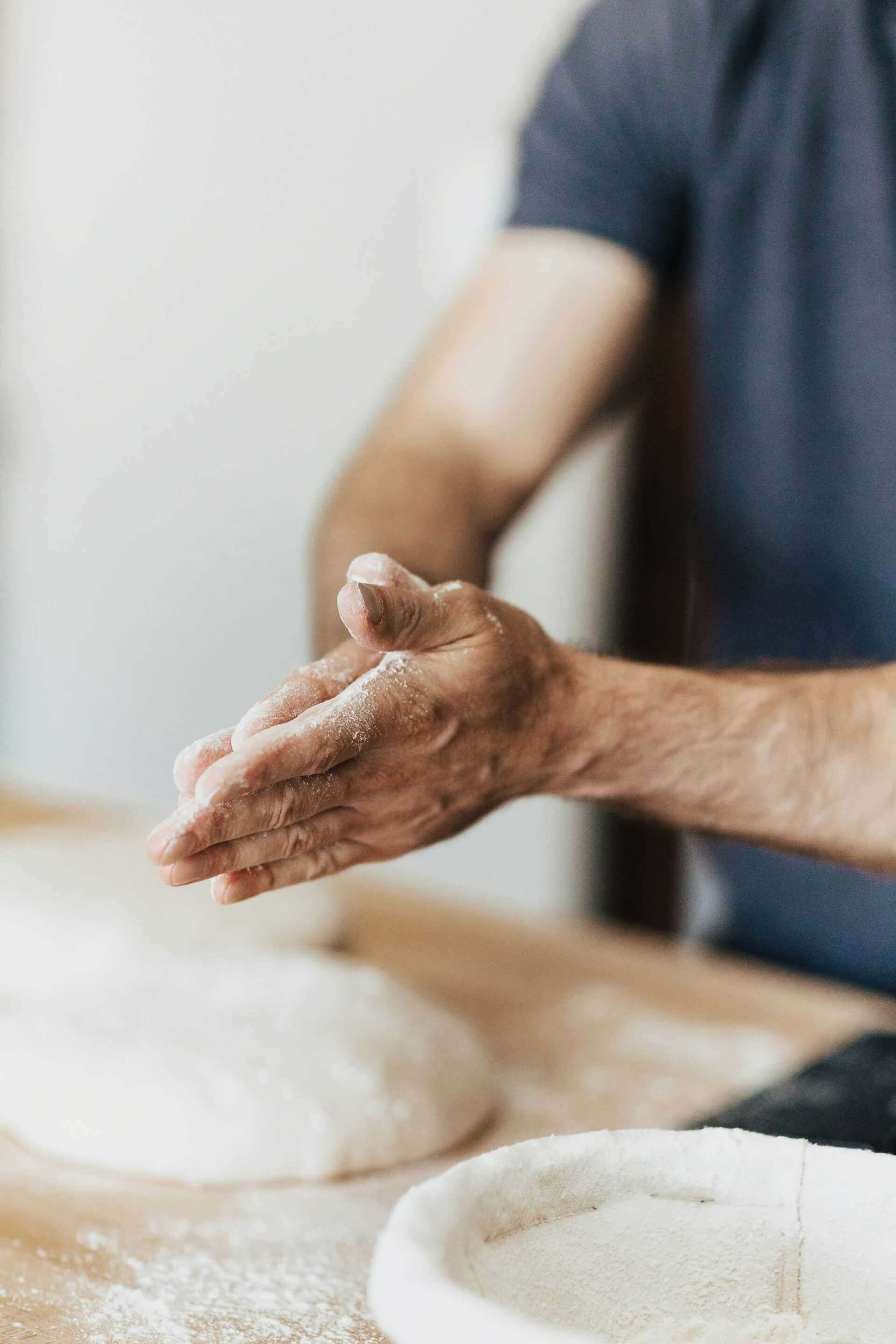 person making dough